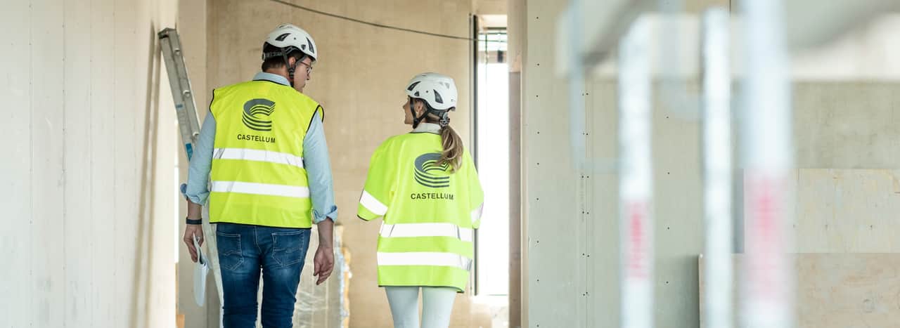 Person smiling at another person across the table.